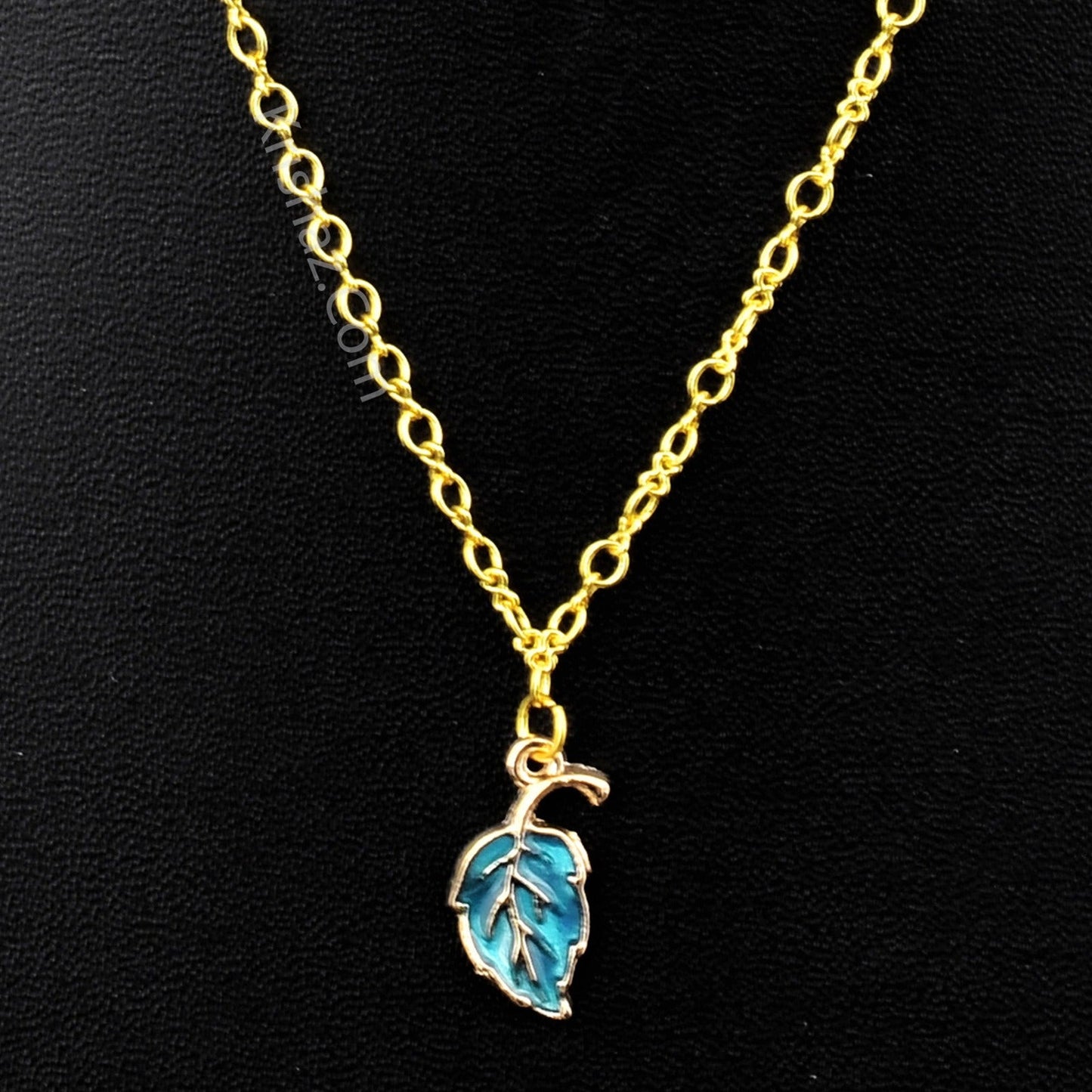 Gold Figure 8 Chain with Leaf charms